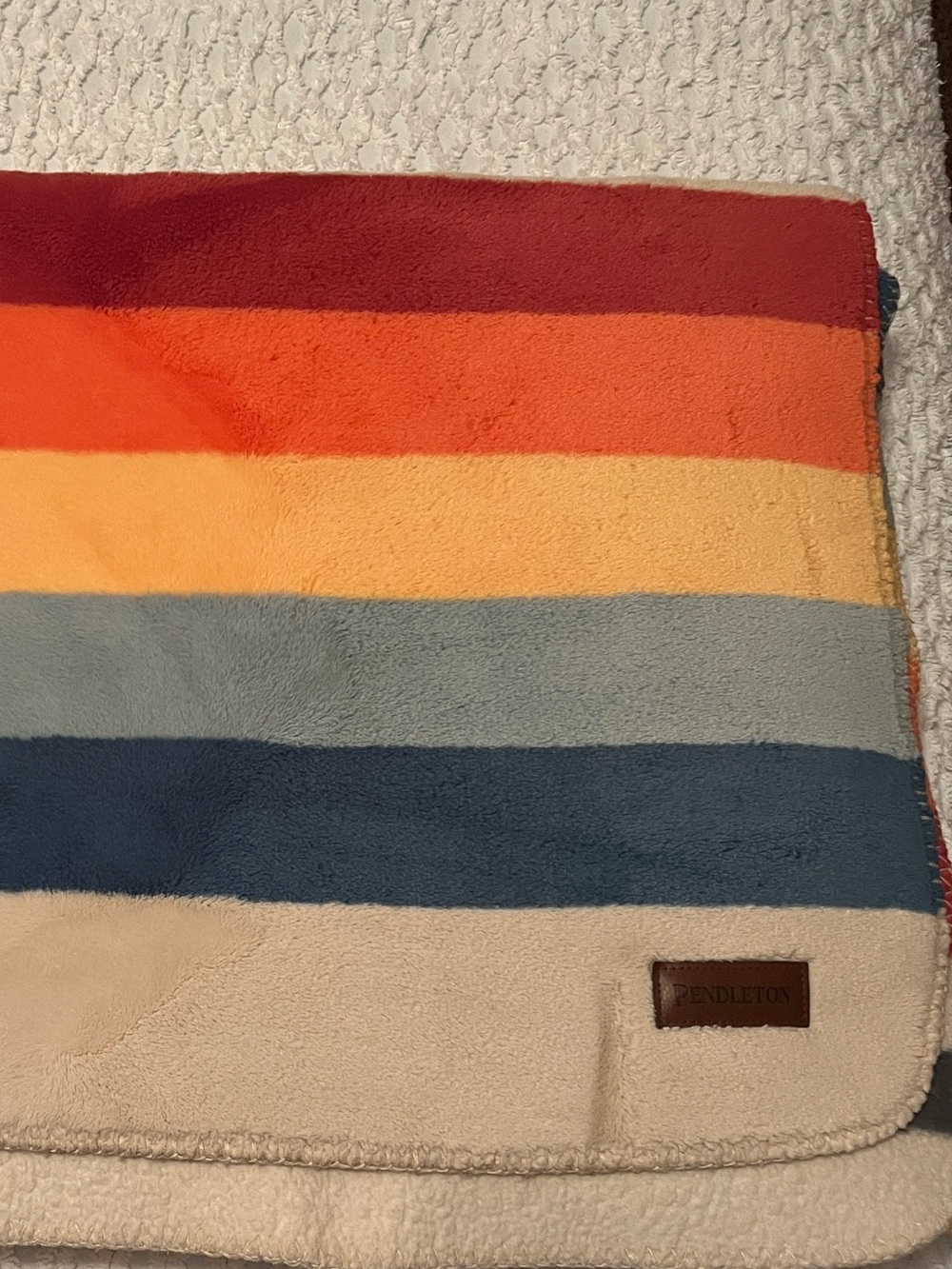 Pendleton Striped Plush Throw in Red, Orange, Yellow, Blue, Cream